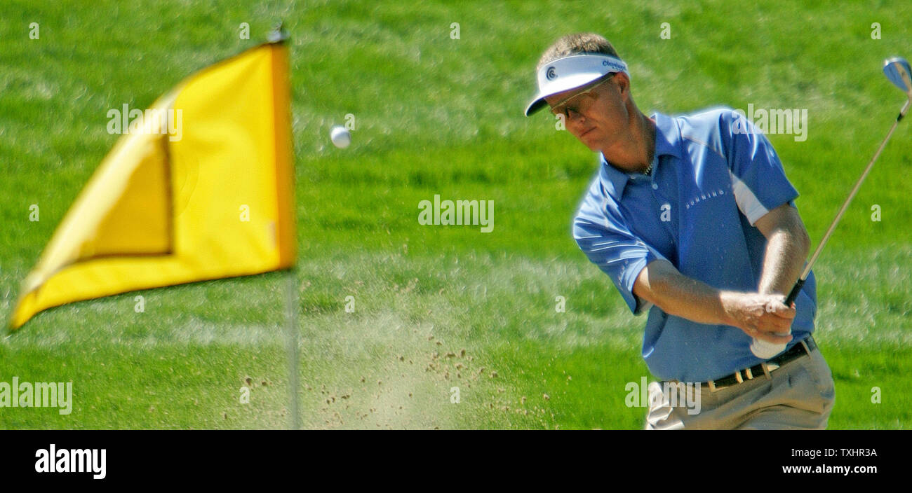 John Senden eyes his bunker shot on the ninth hole during the second round of The International at Castle Pines Golf Club in Castle Rock, Colorado August 11, 2006. Senden bogeyed the hole but continued his early second round lead with fifteen points because of The International's modified Stableford scoring system.    (UPI Photo/Gary C. Caskey) Stock Photo