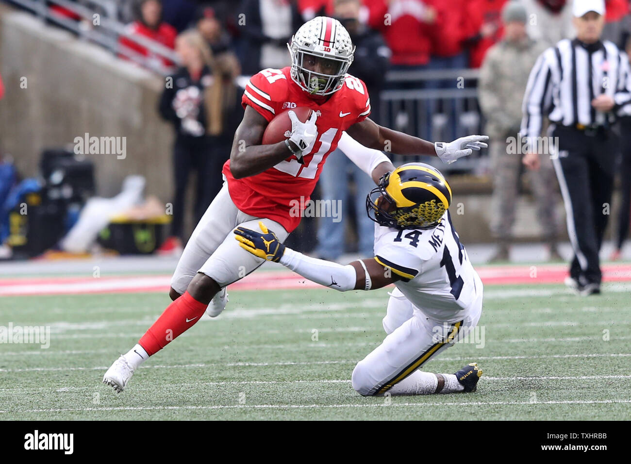 ohio-states-parris-campbell-jr-runs-out-of-the-grasp-of-michigans-josh-metellus-november-24-2018-in-columbus-ohio-photo-by-aaron-josefczykupi-TXHRBB.jpg