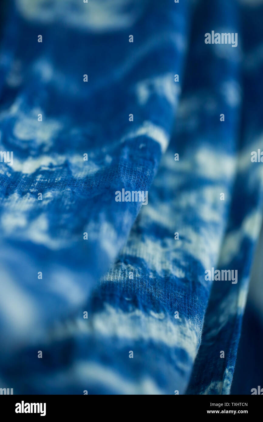 Batik braid glowing dots abstract background Stock Photo