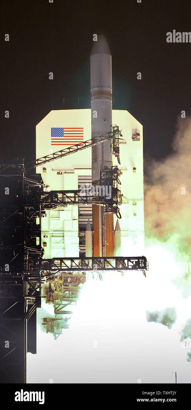 The  United Launch Alliance Delta 4 launched from Space Launch Complex 37B at 8:47 p.m. on December 5,2009 at Cape Canaveral Air Force Station,Florida .The rocket powered by four solid rocket boosters will deploy the third Wideband Global SATCOM spacecraft satellite to serve the U.S.military forces.UPI/ Joe Marino-Bill Cantrell Stock Photo