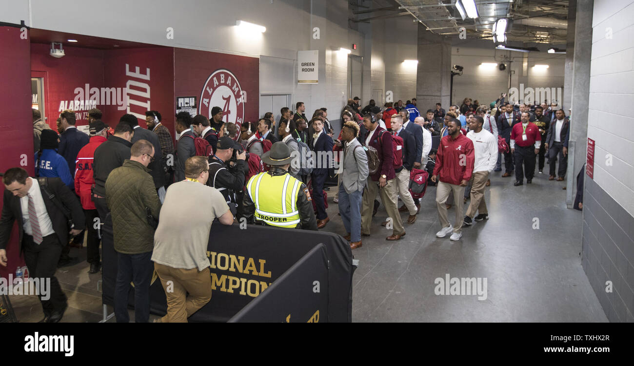 The Alabama Crimson Tide Arrive At Their Locker Room Before