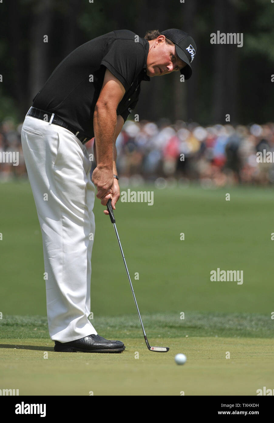 Phil Mickelson putts on the 1st green during the fourth round of the Quail Hollow Tournament in Charlotte, North Carolina on May 2, 2010.   UPI/Kevin Dietsch Stock Photo
