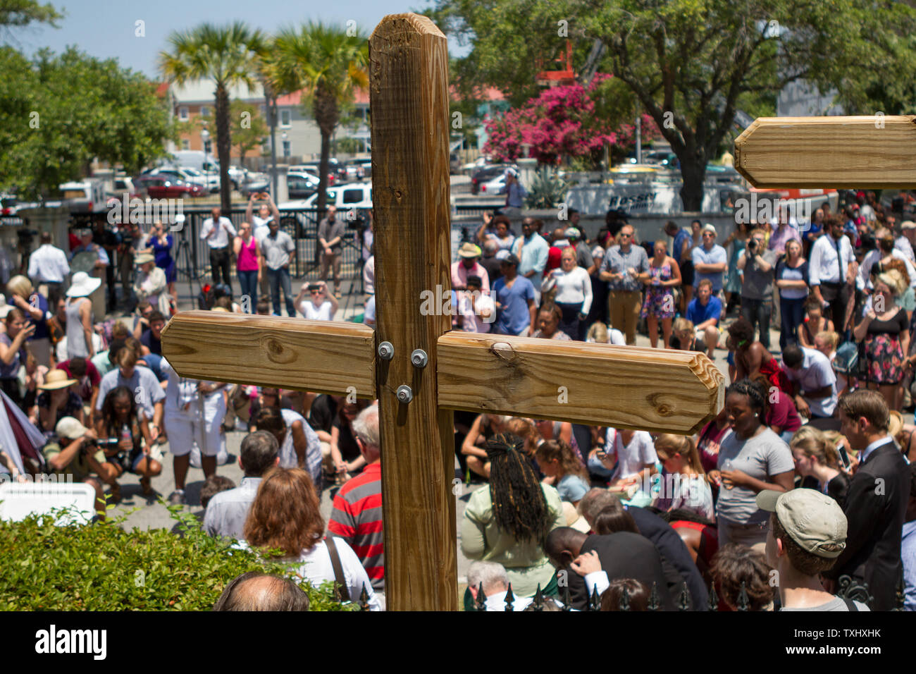 Hundreds of residents gather for a prayer vigil outside the Morris Brown AME church in Charleston, South Carolina on June 18, 2015. The vigil attended by hundreds was in honor of the nine people killed by a lone gunman at the Mother Emanuel African Methodist Episcopal Church on June 17, 2015.  The  suspect was captured.  Photo by Gillian Ellis/UPI Stock Photo