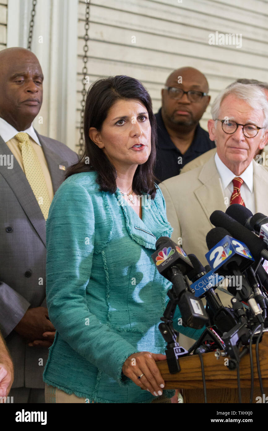 Governor Nikki Haley along with Charleston Mayor Joe Riley chokes back emotions as she discusses the mass killing and capture of the suspect who alledgedly murdered nine people at historic Mother Emanuel African Methodist Episcopal Church in Charleston, South Carolina on June 18, 2015.  Photo by Gillian Ellis/UPI Stock Photo