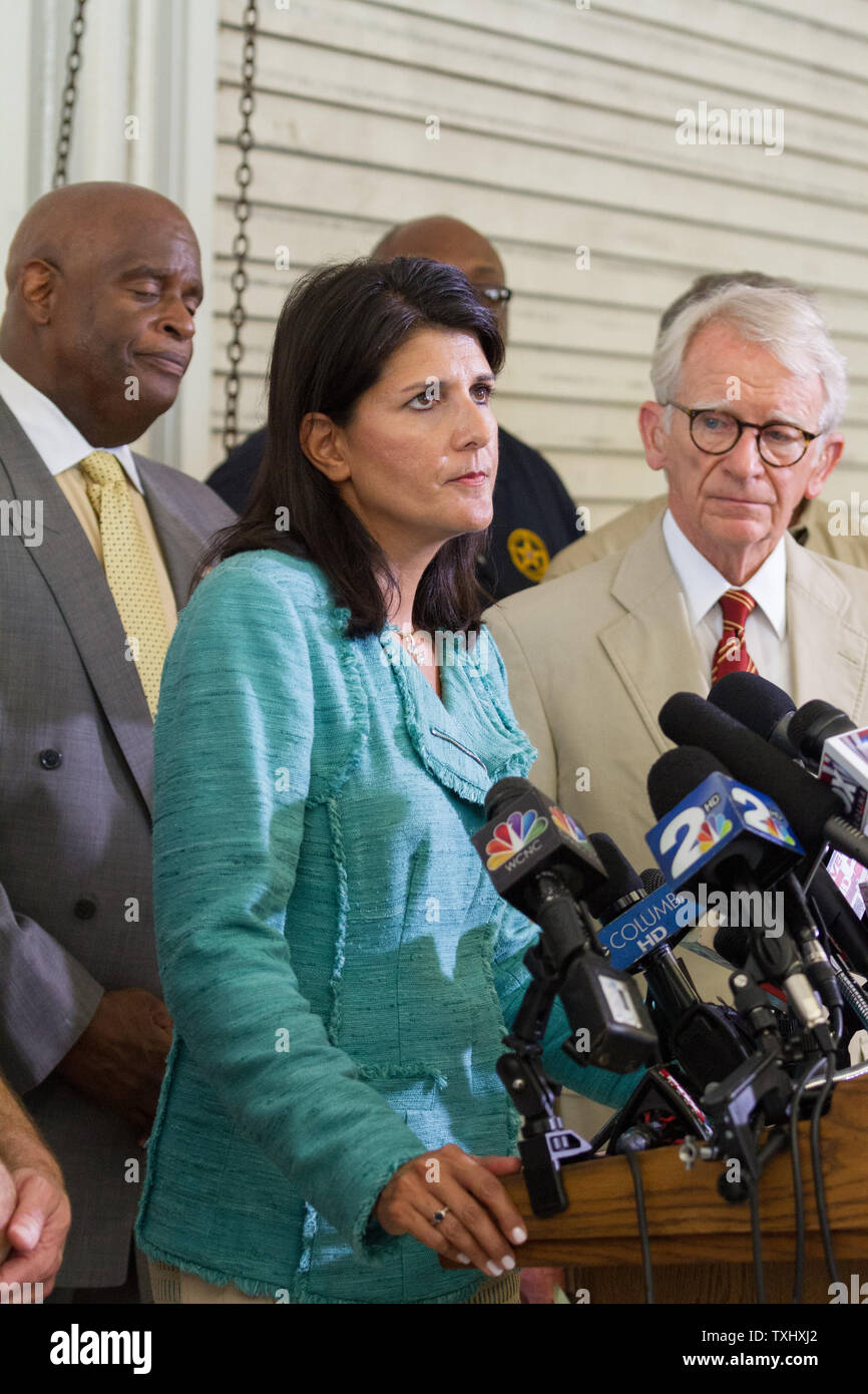 Governor Nikki Haley along with Charleston Mayor Joe Riley chokes back emotions as she discusses the mass killing and capture of the suspect who alledgedly murdered nine people at historic Mother Emanuel African Methodist Episcopal Church in Charleston, South Carolina on June 18, 2015.  Photo by Gillian Ellis/UPI Stock Photo