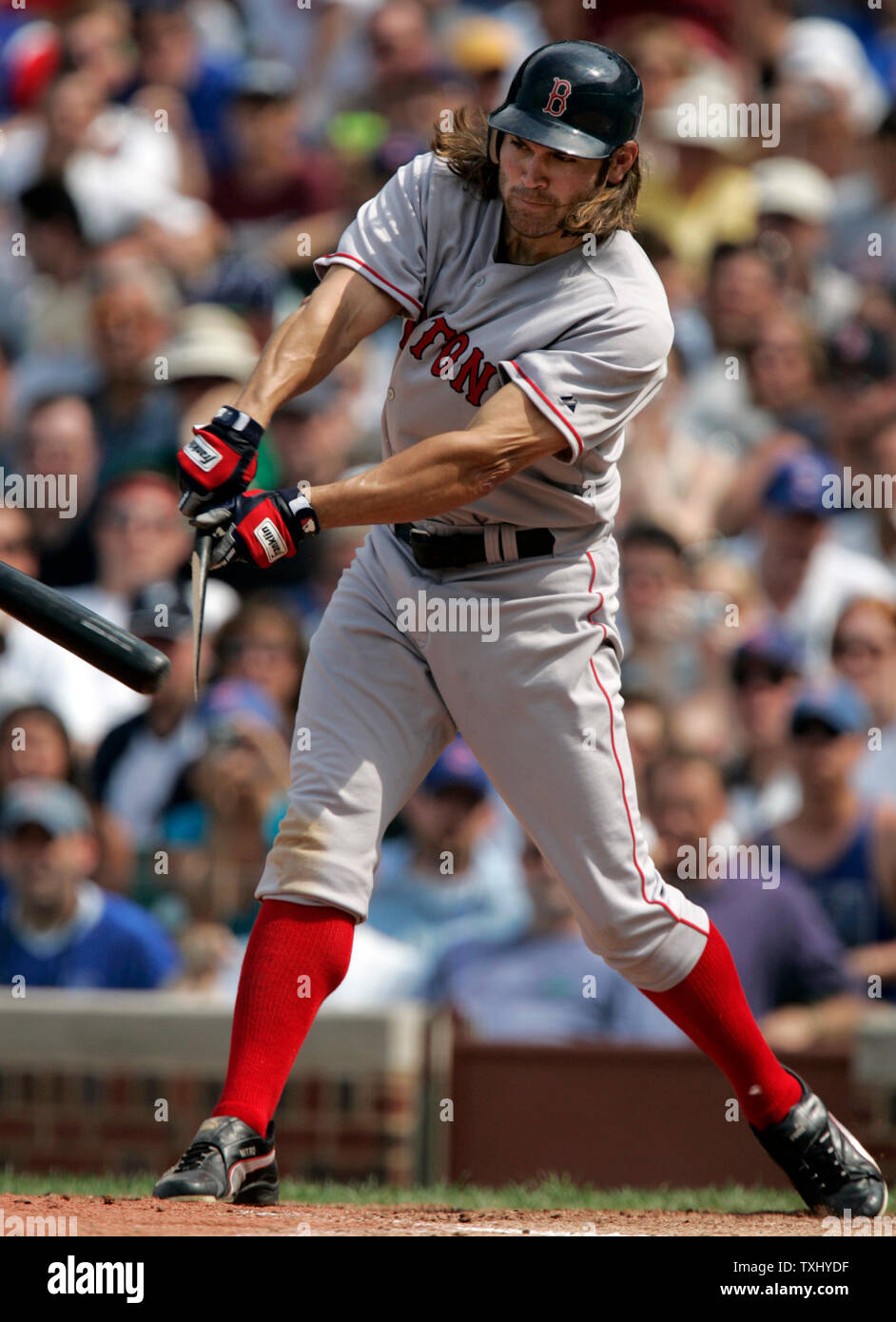 Boston Red Sox's Johnny Damon (18) breaks his bat singling against