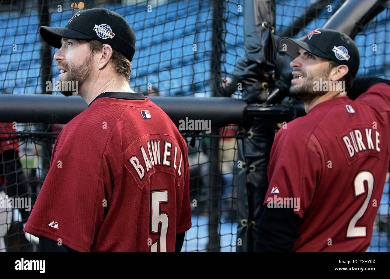 Houston Astros Jeff Bagwell (5) and Chris Burke (2) watch a fly ball by  teammate Craig Biggio at the batting cage at U.S. Cellular Field in  Chicago, Il. October 21, 2005. The