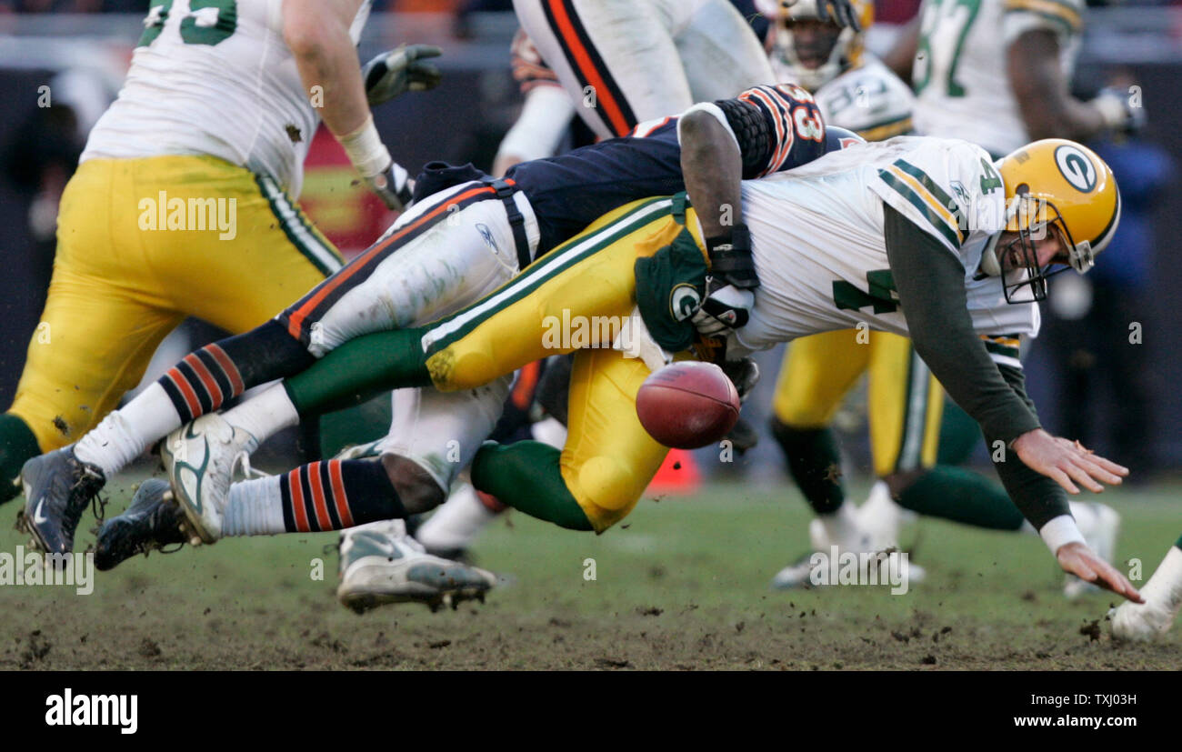 Green Bay Packers quarterback Brett Favre (4) fumbles the ball as he is  sacked by Chicago Bears cornerback Charles Tillman (33) during the fourth  quarter on December 4, 2005 at Soldier Field