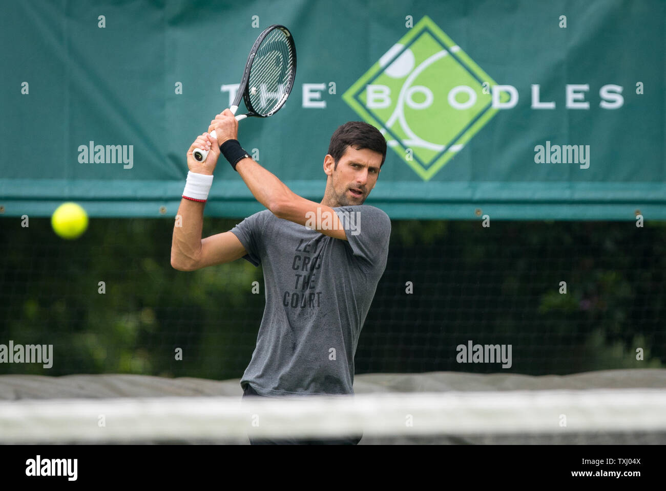 slough-uk-25th-june-2019-novak-djokovic-of-serbia-practice-session-during-the-the-boodles-tennis-2019-event-at-stoke-park-slough-england-on-25-june-2019-photo-by-andy-rowland-credit-prime-media-imagesalamy-live-news-TXJ04X.jpg