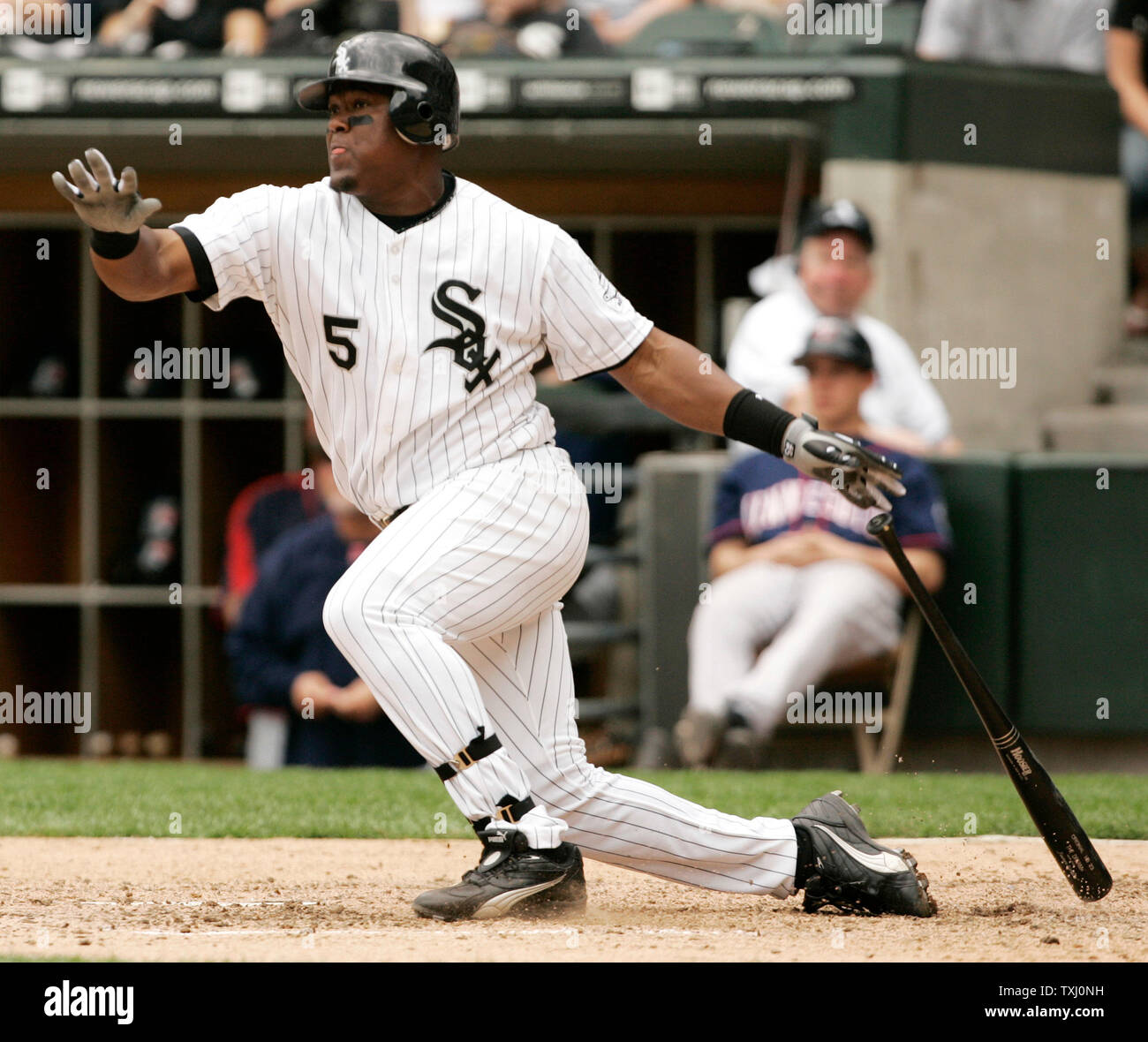 Chicago White Sox's Nick Swisher follows through on a solo homer during the  fourth inning against