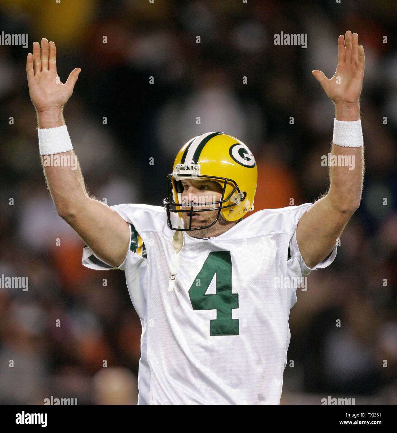 Green Bay Packers quarterback Brett Favre throws a snowball toward teammate  Donald Driver as they celebrate a touchdown in the second half against the  Seattle Seahawks. The Packers defeated the Seahawks 42-20