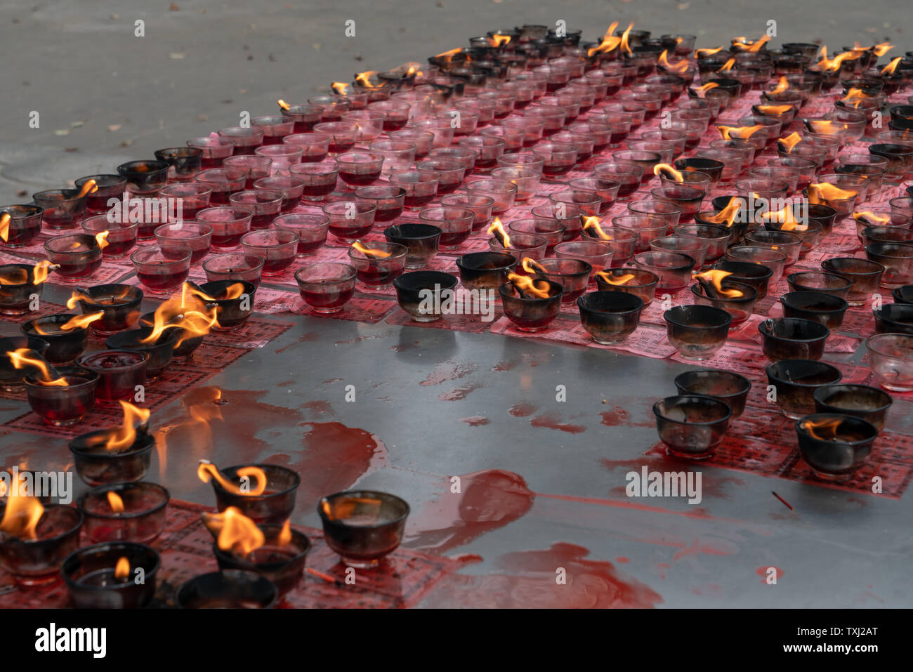 The ghee lamp worshipped at the Daci Temple Stock Photo Alamy