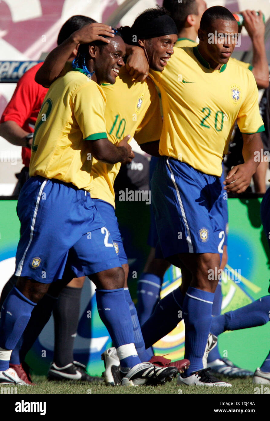 Brazil midfielder Ronaldinho (10) is congratulated by teammates Vagner Love (22) and Julio Baptista (20) after scoring a goal against the USA in their international friendly soccer match at Soldier Field in Chicago, September 9, 2007. Brazil defeated the USA 4-2.  (UPI Photo/Mark Cowan) Stock Photo