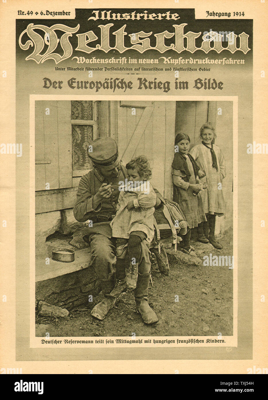 1914 Illustrierte Weltschau front page German soldier feeding a French girl Stock Photo