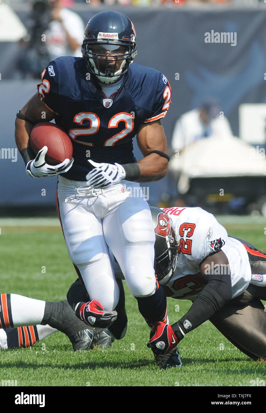 Chicago Bears running back Matt Forte runs for a 4 yard gain as Tampa Bay Buccaneers defender Nick Roach makes the tackle during the first quarter at Soldier Field in Chicago on September 21, 2008. (UPI Photo/David Banks) Stock Photo