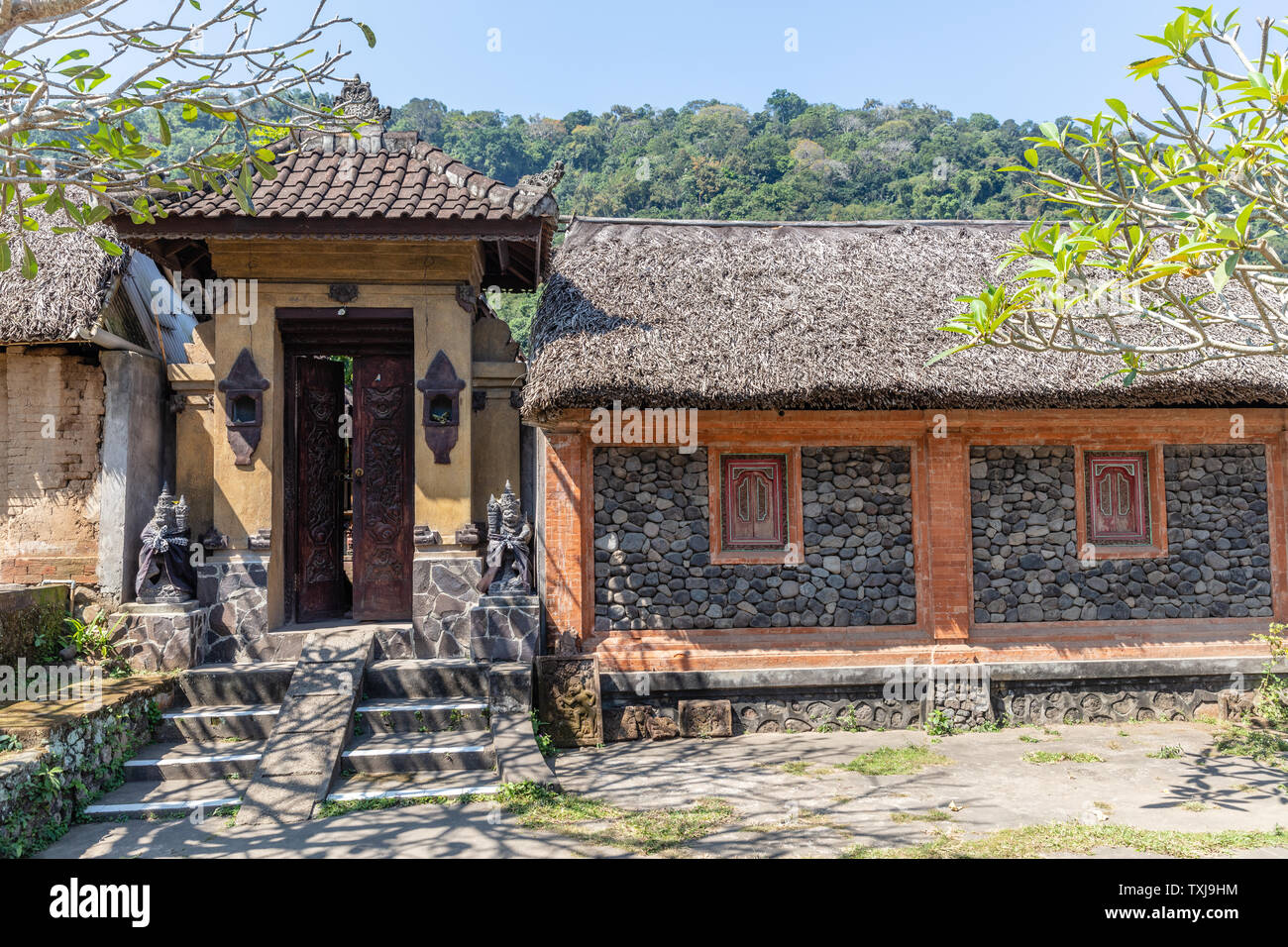 Traditional houses in Bali Aga village Tenganan Pegringsingan in Karangasem Regency, Bali, Indonesia. Stock Photo