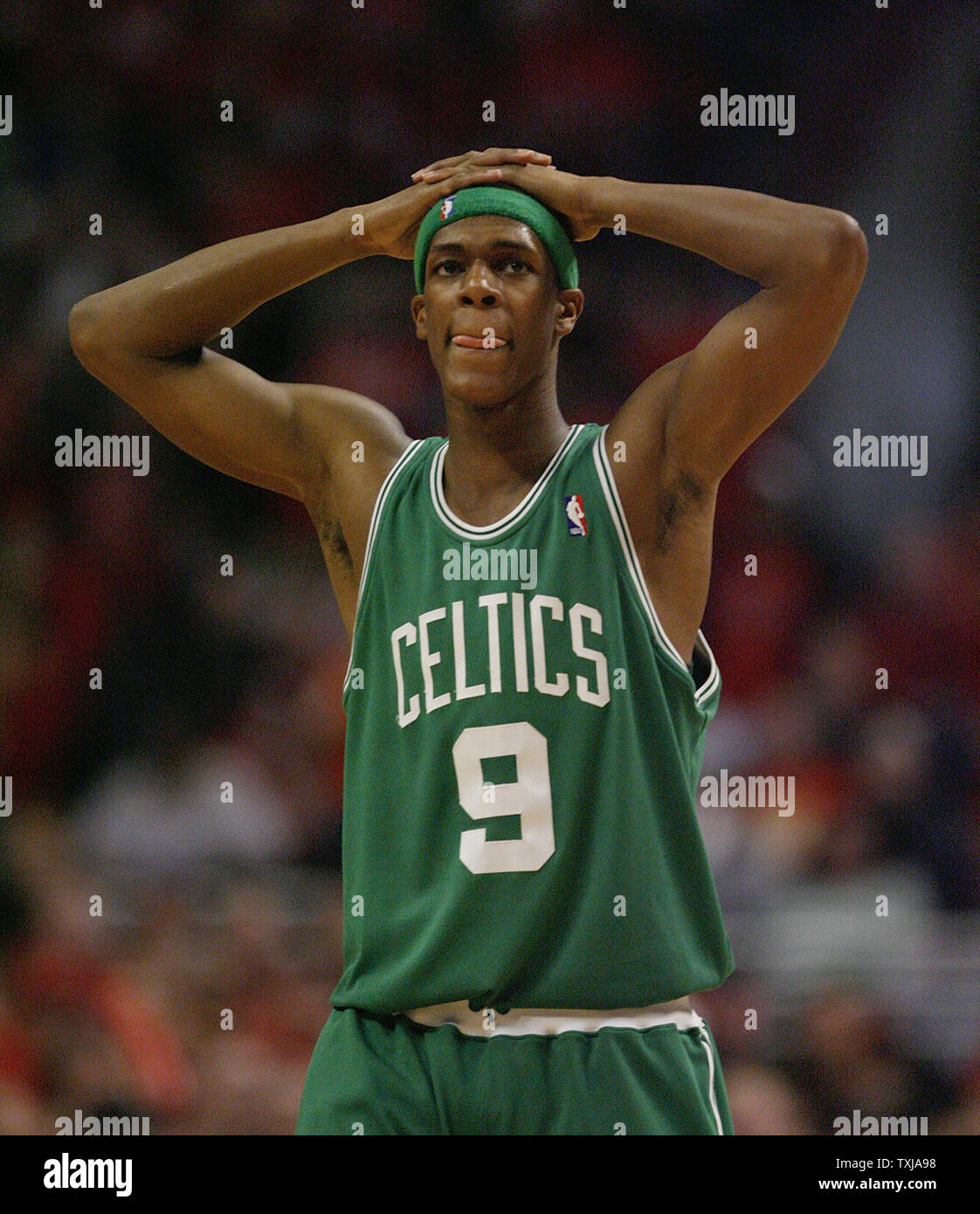 Boston Celtics' Rajon Rondo puts his hands on his head during a timeout in  the fourth quarter of game 4 of their NBA Eastern Conference Quarterfinal  at the United Center in Chicago