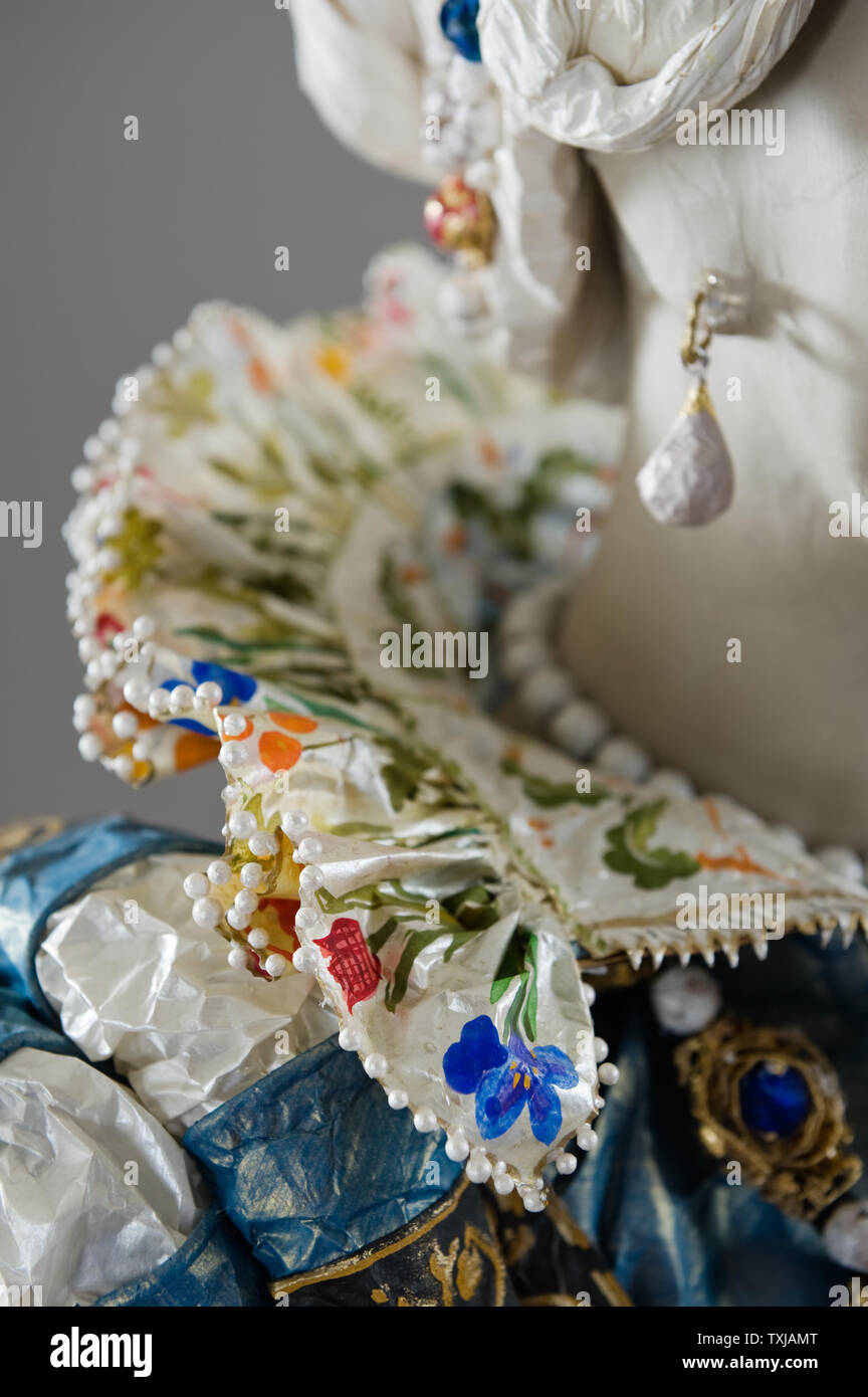 Floral collar detail of paper costume by Isabelle de Borchgrave Stock Photo