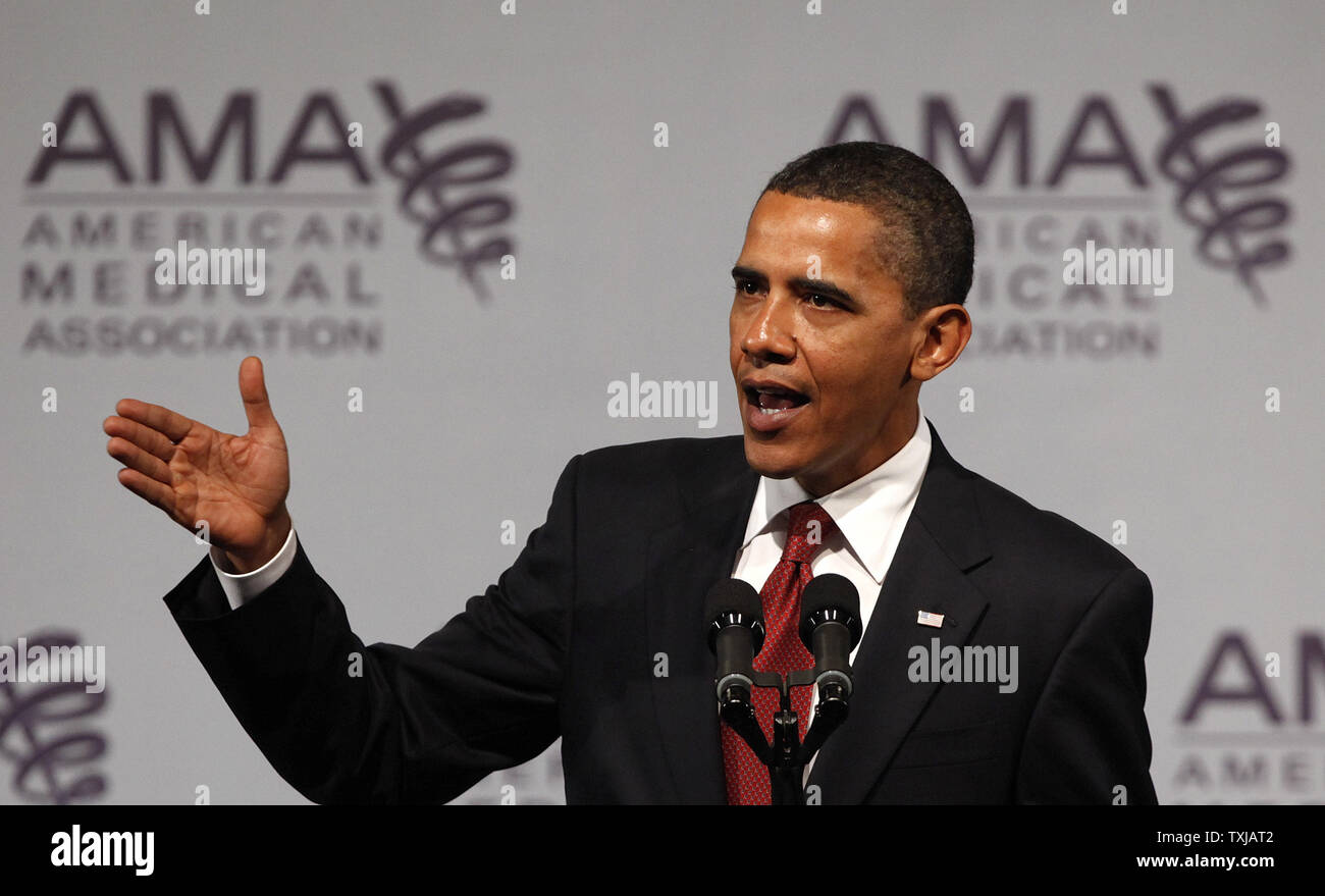 President Barack Obama addresses the American Medical Association's annual meeting on June 15, 2009 in Chicago. Obama's speech to the AMA is his latest effort to persuade skeptics that his health care plan is worth the expected high cost. (UPI Photo/Brian Kersey) Stock Photo
