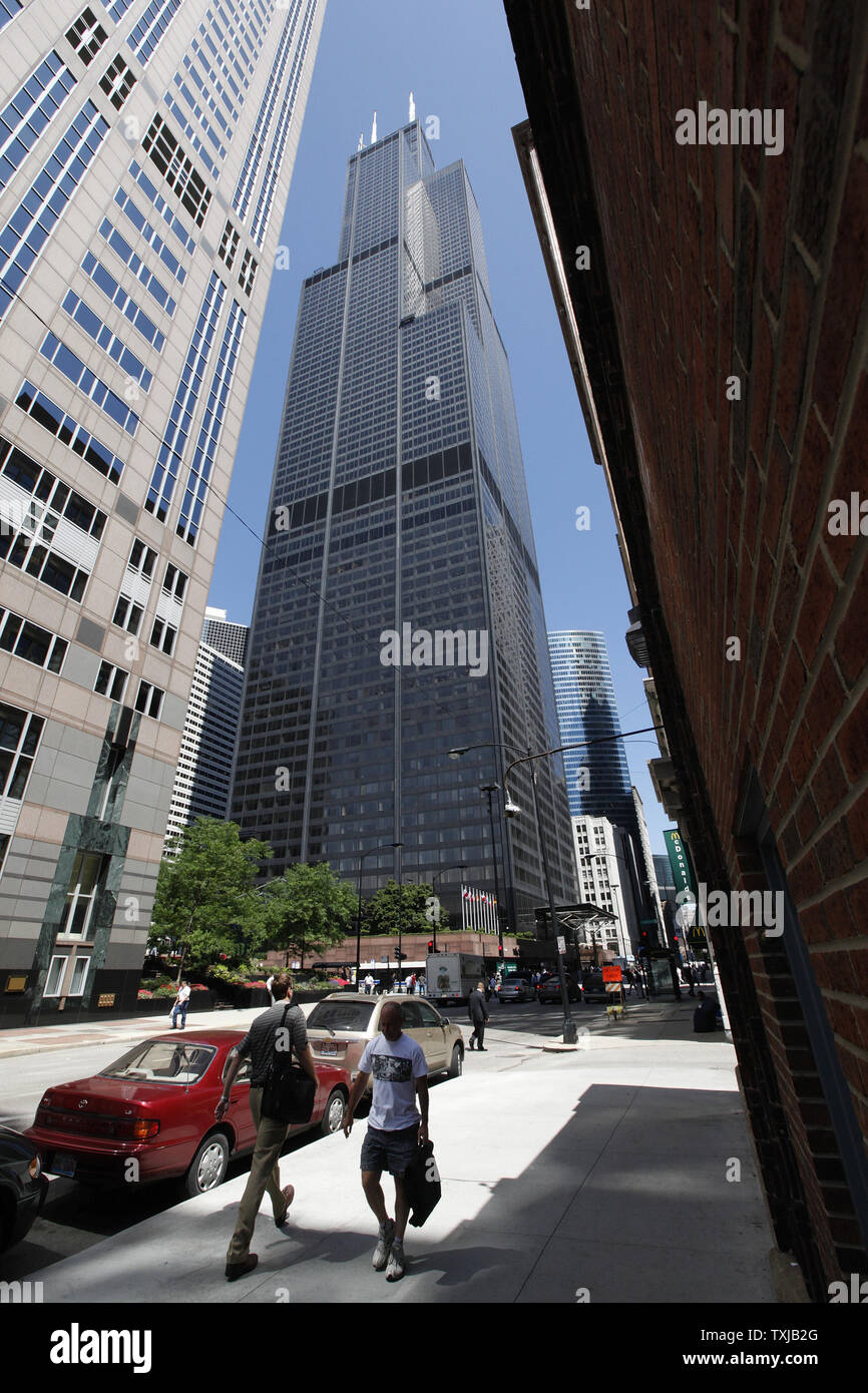 The 110story Willis Tower rises above the street in Chicago on July 16