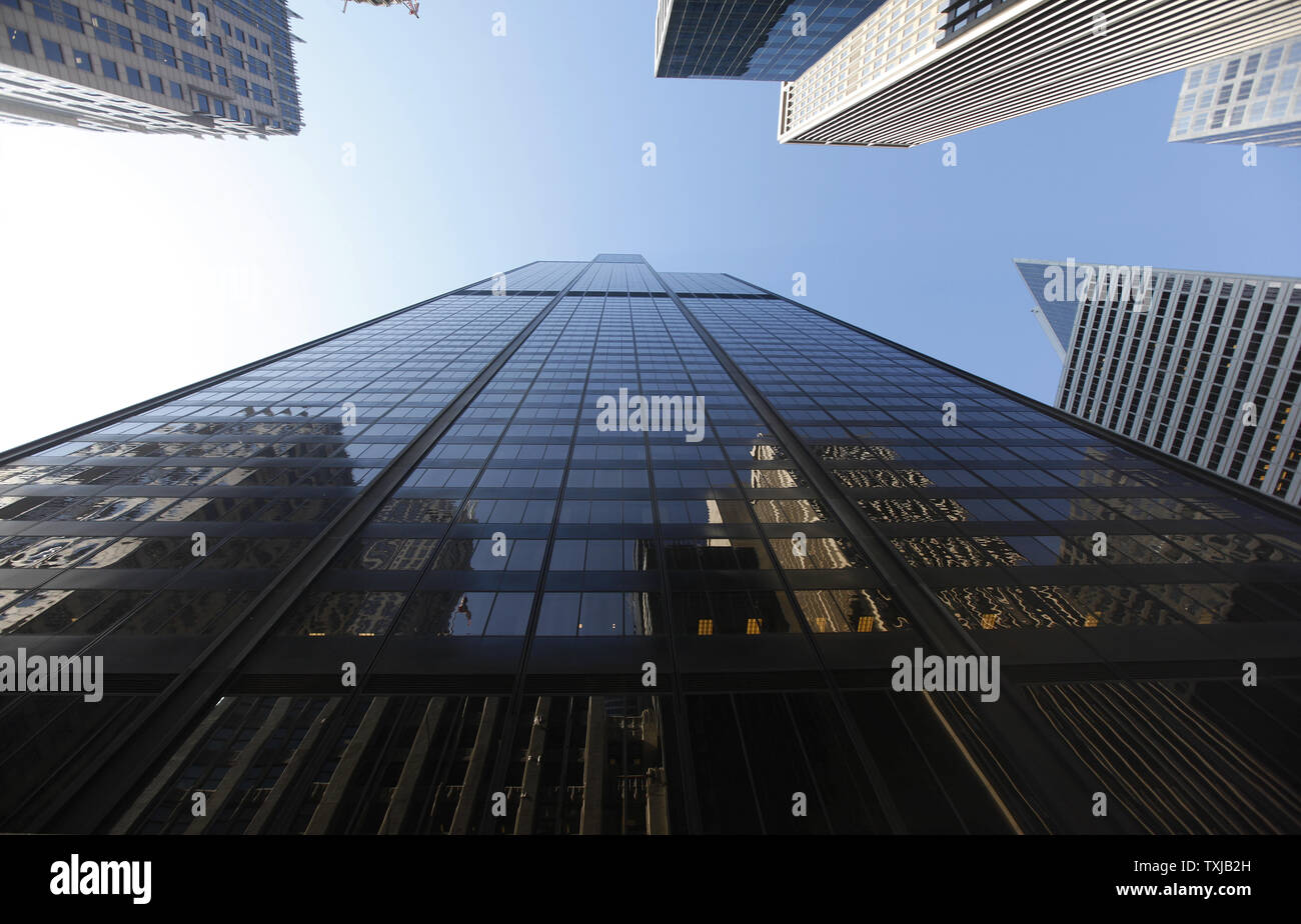 The 110story Willis Tower rises above the street in Chicago on July 16