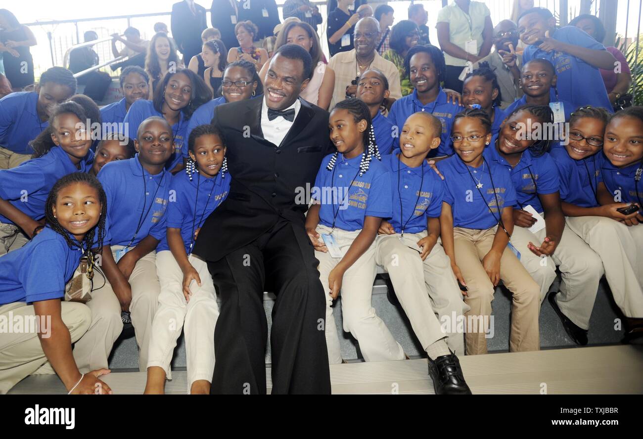 Dream Team member David Robinson has his picture taken with kids from the Chicago South Swim team arrives on the blue carpet at the U.S. Olympic Hall of Fame Class of 2009 Induction ceremony in Chicago on August 12, 2009. The 1992 U.S. Men's Olympic Basketball Team, along with nine other U.S. athletes and special contributors will be honored at the U.S. Olympic Hall of Fame Induction Ceremony.     UPI/David Banks Stock Photo