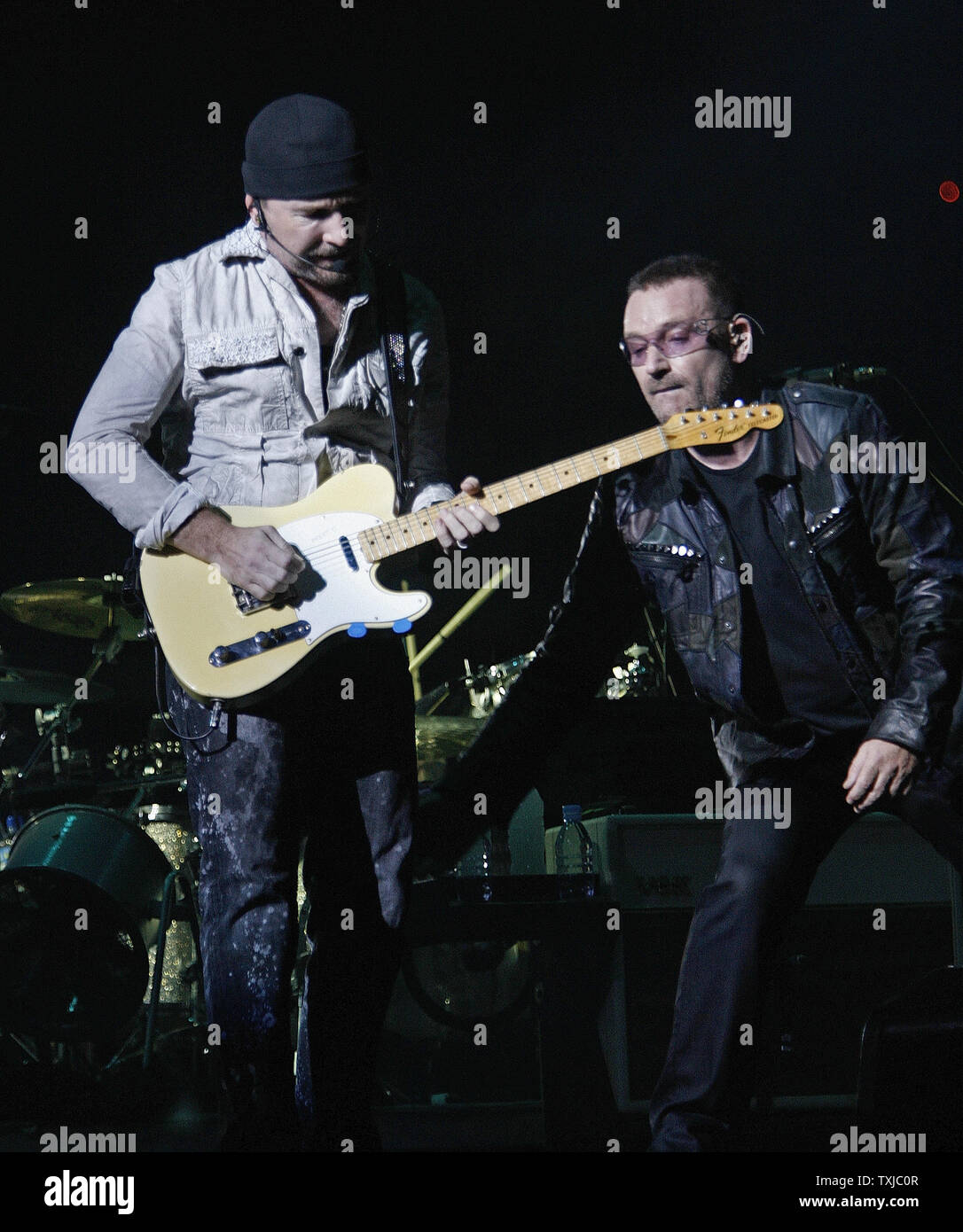 The Edge (L) and Bono of U2 perform the first concert of their 360 Degree North American Tour at Soldier Field in Chicago on September 12, 2009.     UPI/Brian Kersey Stock Photo