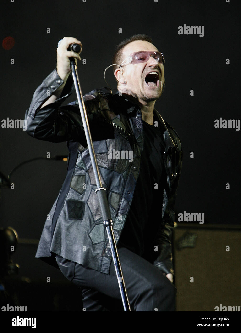 Bono of U2 performs at the first concert of their 360 Degree North American Tour at Soldier Field in Chicago on September 12, 2009.     UPI/Brian Kersey Stock Photo
