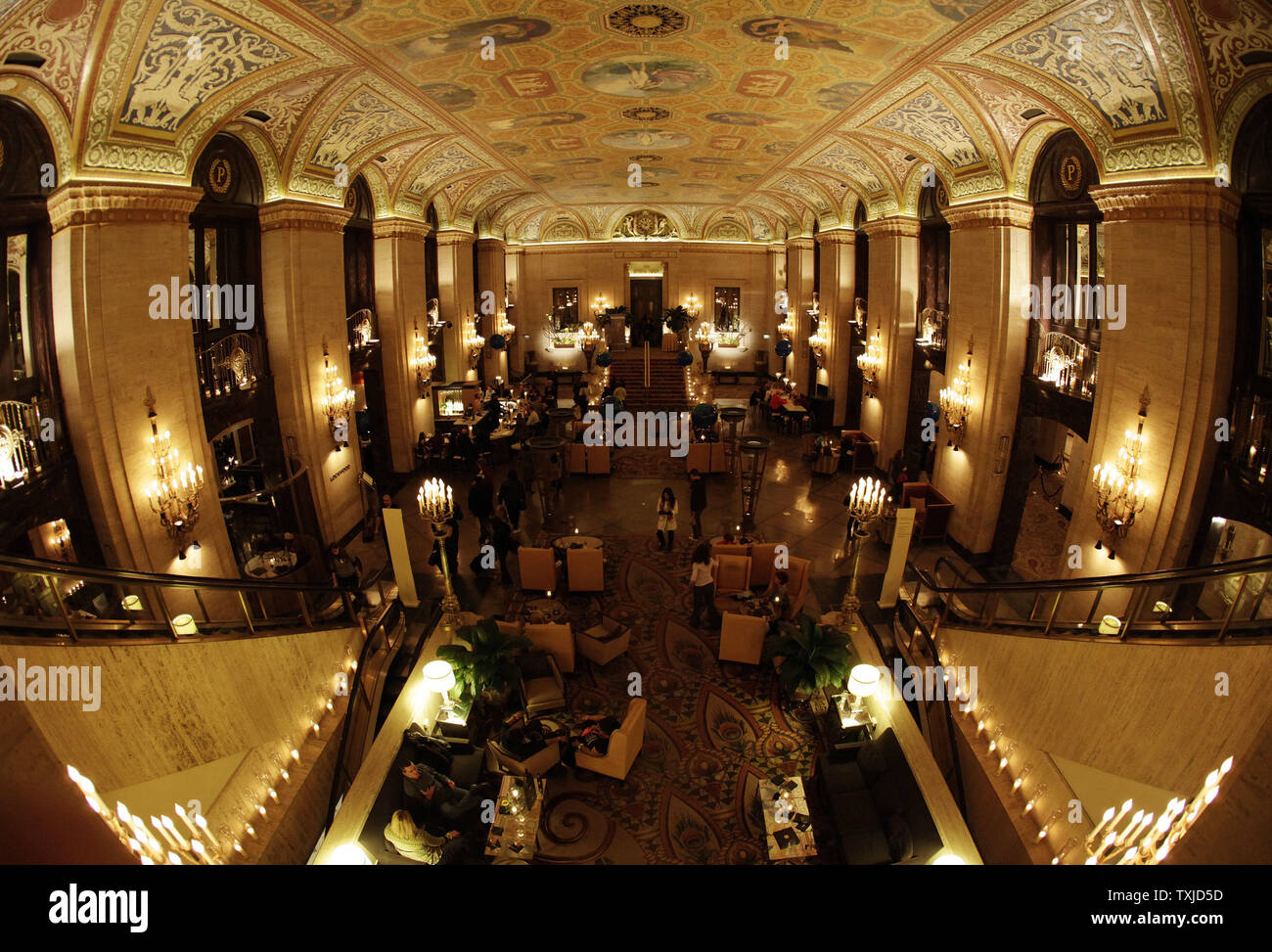 The lobby of the Palmer House Hilton hotel turns on its lights after observing Earth Hour in Chicago on March 27, 2010. An estimated one billion people in 121 countries are expected to take part in Earth Hour, a time set aside on Saturday to turn off unnecessary lights for one hour to raise awareness about energy conservation.     UPI/Brian Kersey Stock Photo