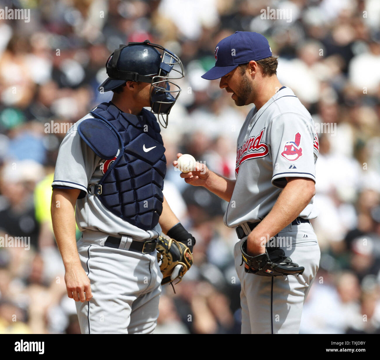 Cleveland Indians catcher Lou Marson talks with pitcher Jake Westbrook during the third inning against the Chicago White Sox on Opening Day at U.S. Cellular Field in Chicago on April 5, 2010. The White Sox won 6-0.     UPI/Brian Kersey Stock Photo