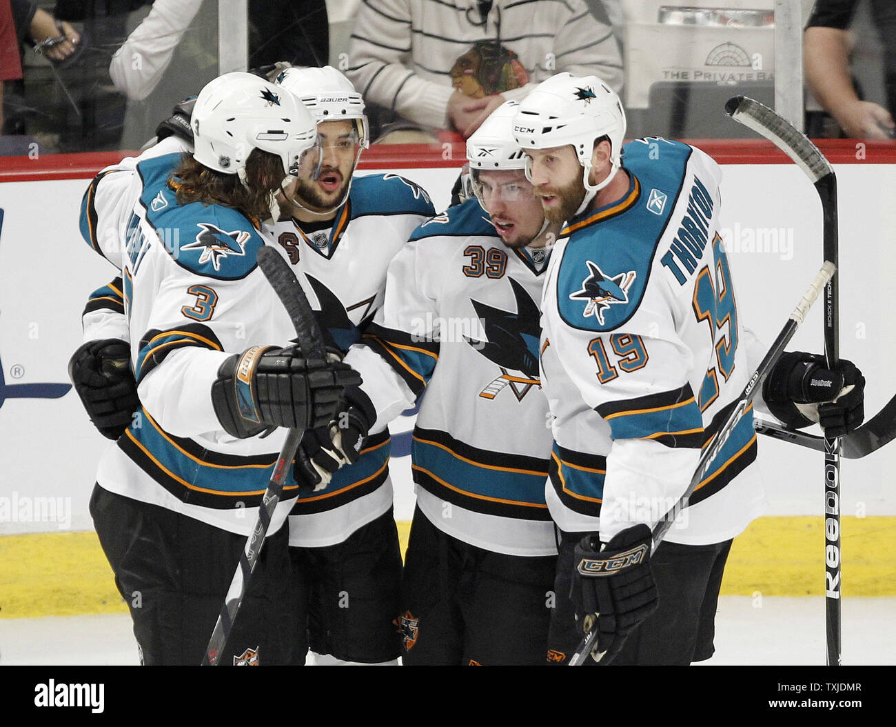 San Jose Sharks defenseman Douglas Murray, right wing Devin Setoguchi, center Logan Couture and center Joe Thornton celebrate Couture's goal during the first period of game 4 of the NHL Western Conference Finals against the Chicago Blackhawks at the United Center in Chicago  on May 23, 2010.     UPI/Brian Kersey Stock Photo