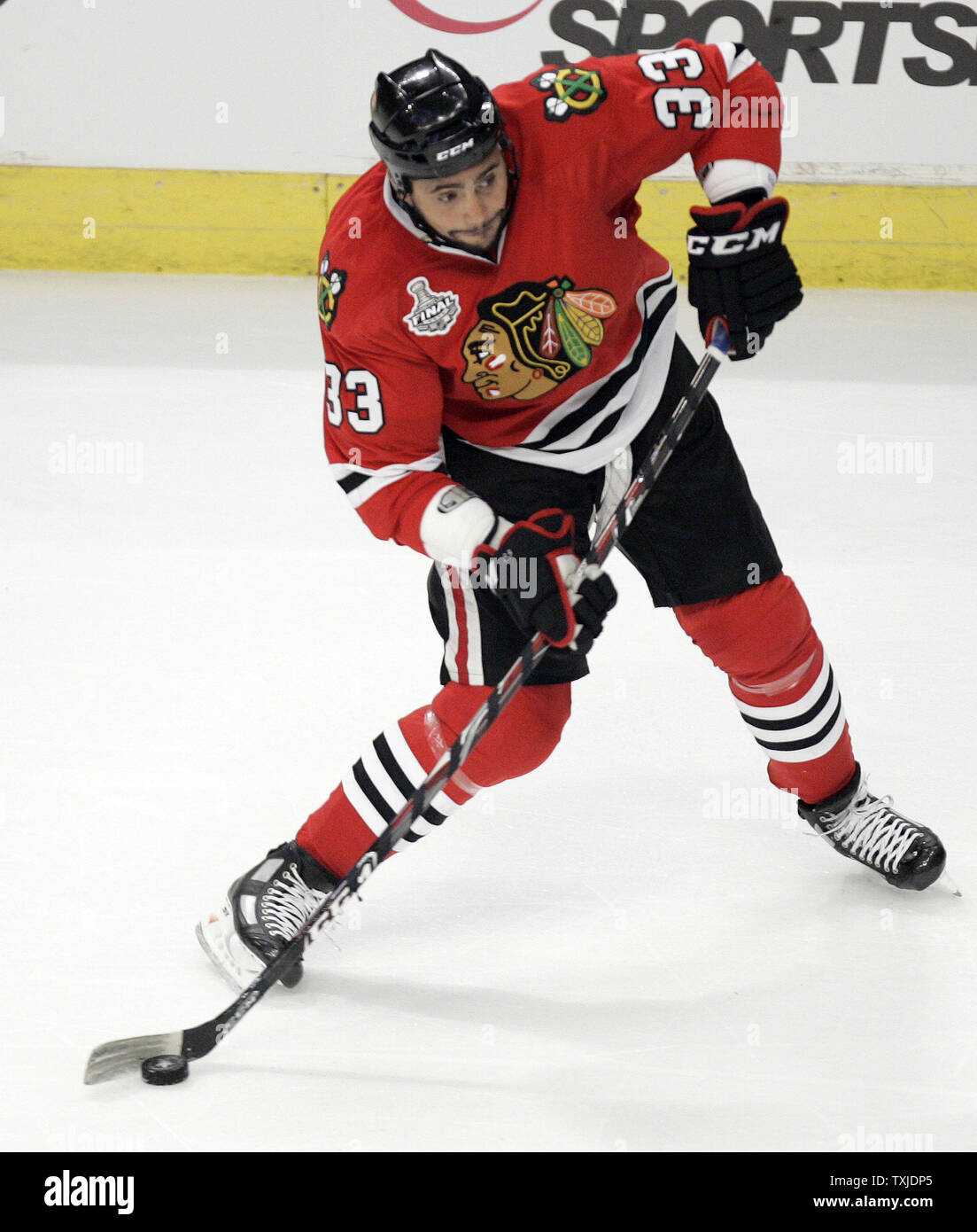 Dustin Byfuglien with Chicago Blackhawks Flag 2010 Stanley Cup Finals (#35)