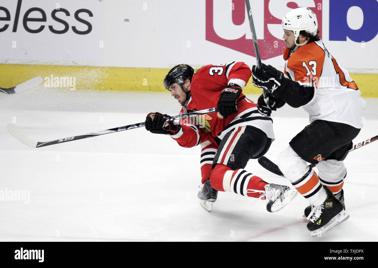 Detroit Red Wings left wing David Perron (57) shoots the puck past