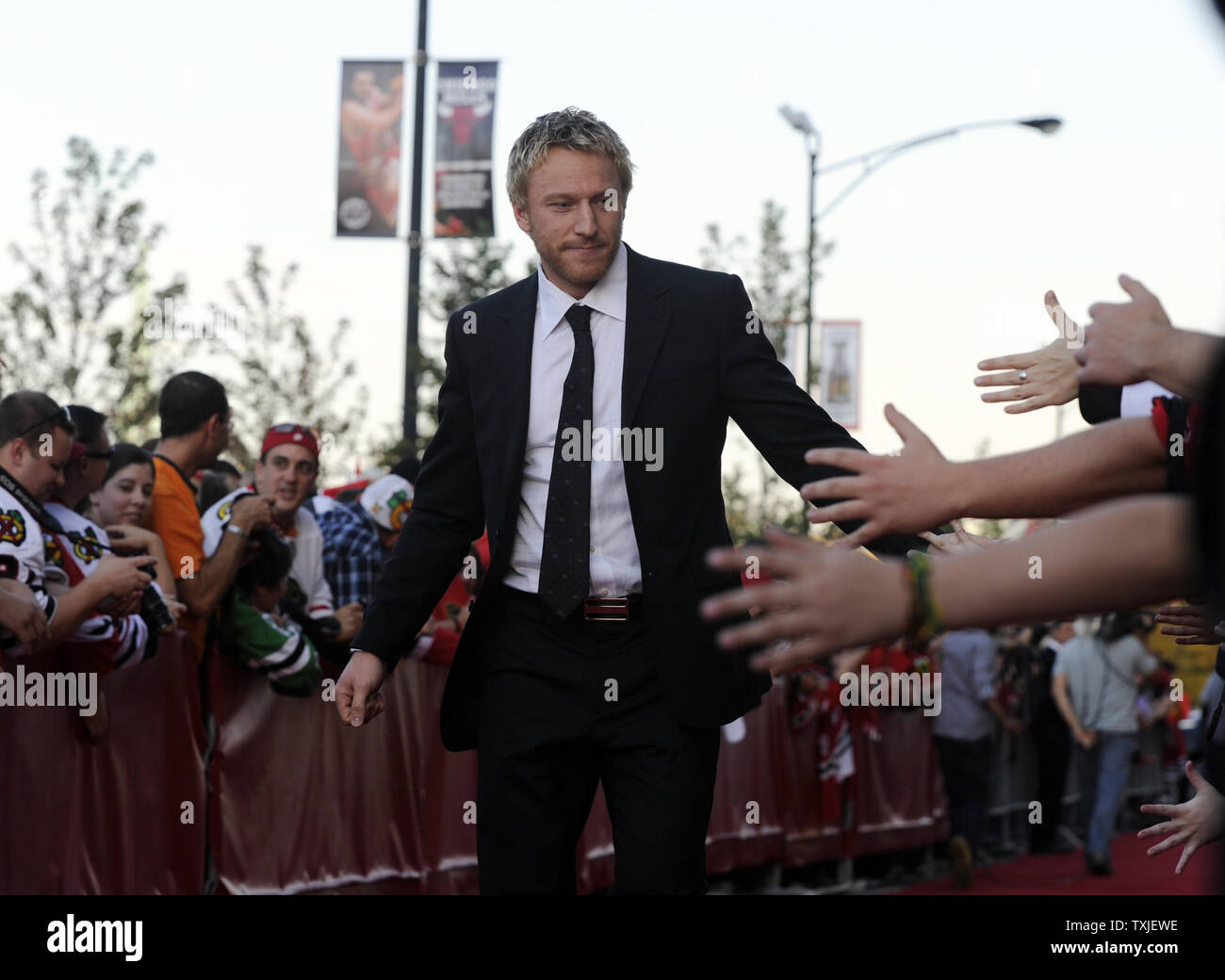 Chicago Blackhawks Marian Hossa walks the red carpet before the Hawks home opener against the Detroit Red Wings at the United Center in Chicago on October 9, 2010 in Chicago.     UPI/David Banks Stock Photo