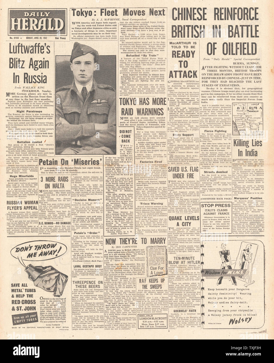 1942 front page Daily Herald U.S. Bombers raid Japan, Chinese Army advance in Burma and Pierre Laval heads Vichy Government Stock Photo