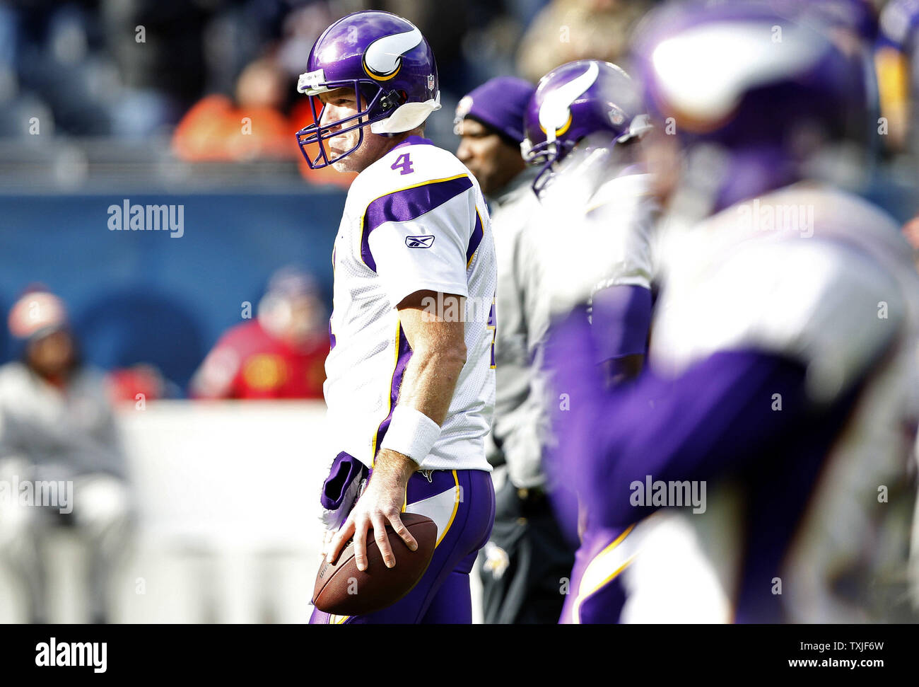 Minnesota Vikings Randy Moss stands in the huddle with Brett Favre in week  5 of the NFL season against the New York Jets at New Meadowlands Stadium in  East Rutherford, New Jersey