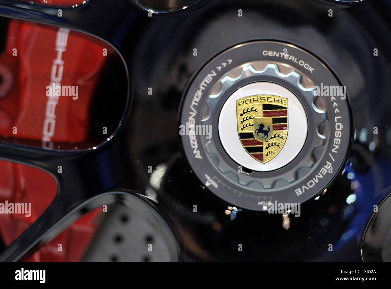 The logo for Porsche is displayed on the wheel of a 2011 911 Carrera at the Chicago Auto Show at McCormick Place in Chicago on February 9, 2011.    UPI/Brian Kersey Stock Photo
