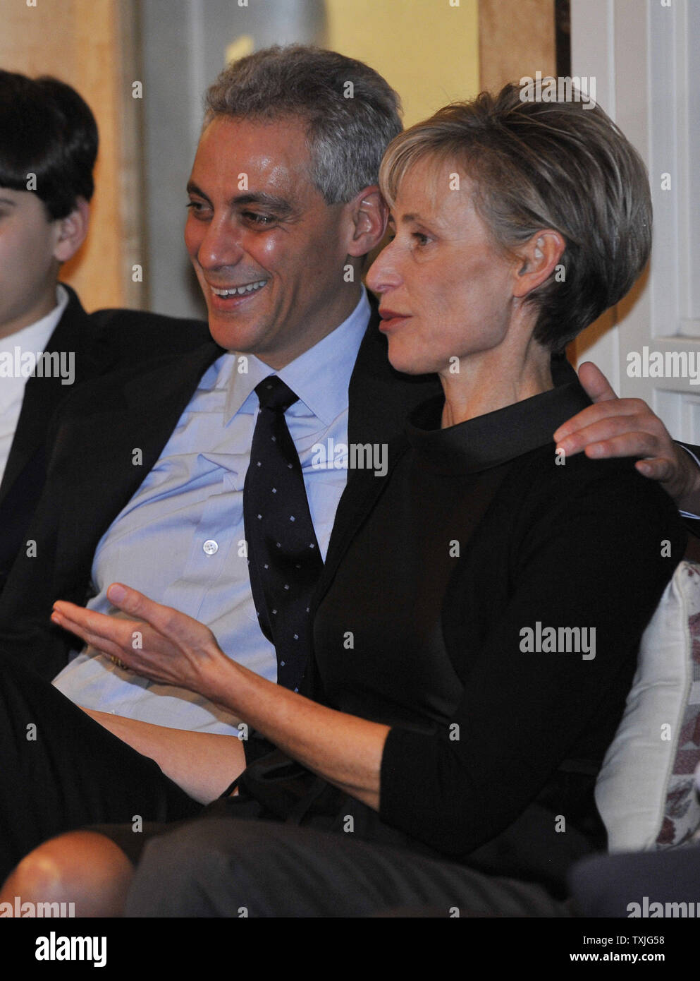 Chicago Mayoral candidate Rahm Emanuel (L) watches election returns with his wife Amy Rule before an election-night rally in Chicago on February 22, 2011.       UPI/Brian Kersey Stock Photo