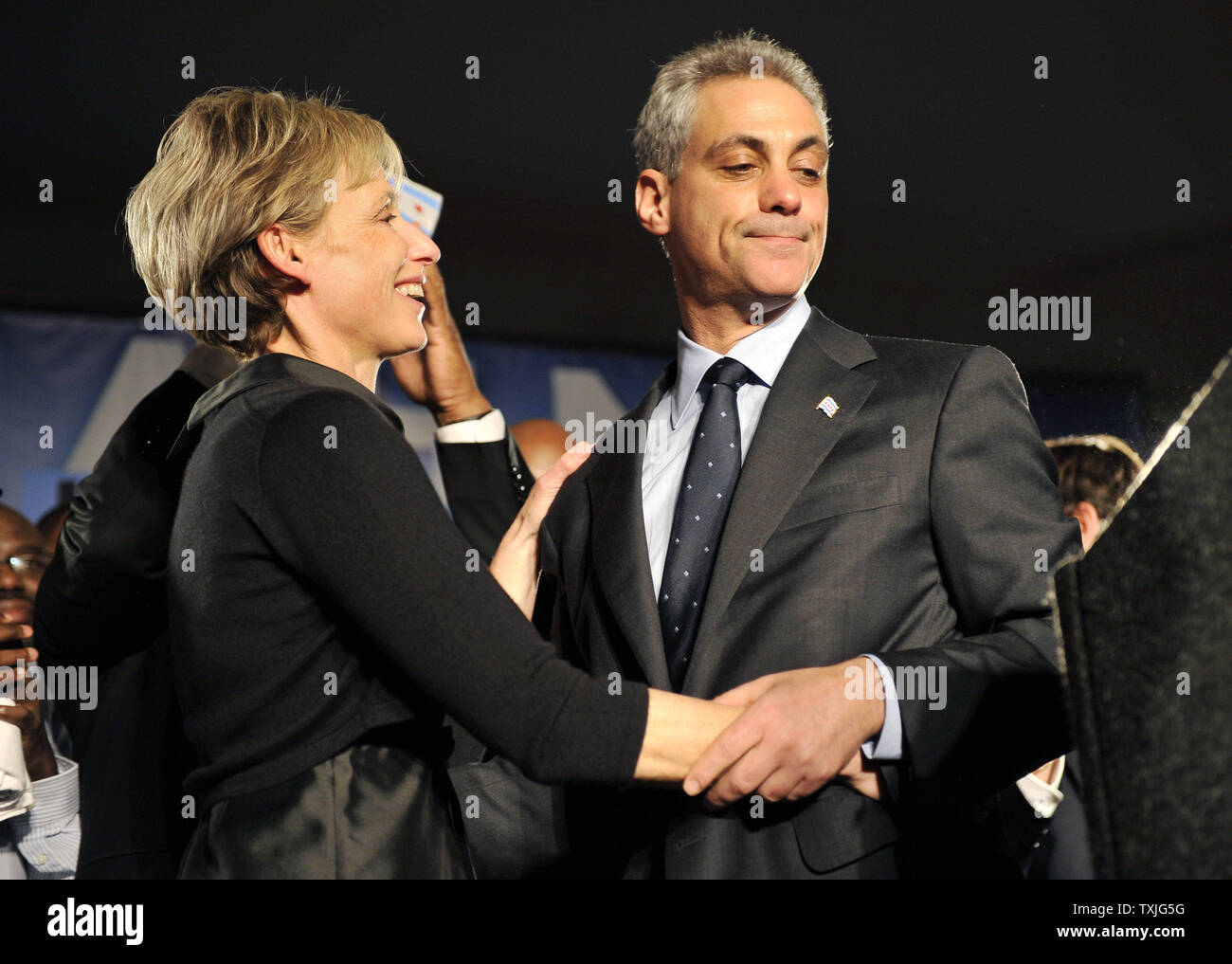 Chicago Mayoral Candidate Rahm Emanuel (R) hugs his wife Amy Rule as he speaks to supporters at an election-night rally in Chicago on February 22, 2011. The former White House chief of staff is being projected as the outright winner by gathering more than 50 percent of the votes in a six-candidate field.      UPI/Brian Kersey Stock Photo