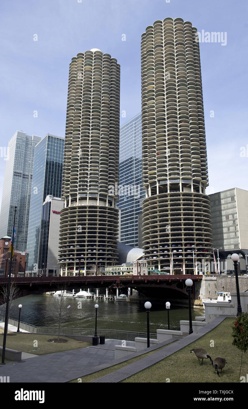 Marina Towers stand along the Chicago River on March 31, 2011 in Chicago. The Marina City complex was designed in 1959 by architect Bertrand Goldberg and completed in 1964 and was billed as a city within a city, featuring numerous on-site facilities including a theatre, gym, swimming pool, ice rink, bowling alley, several stores and restaurants, and a marina.     UPI/Brian Kersey Stock Photo