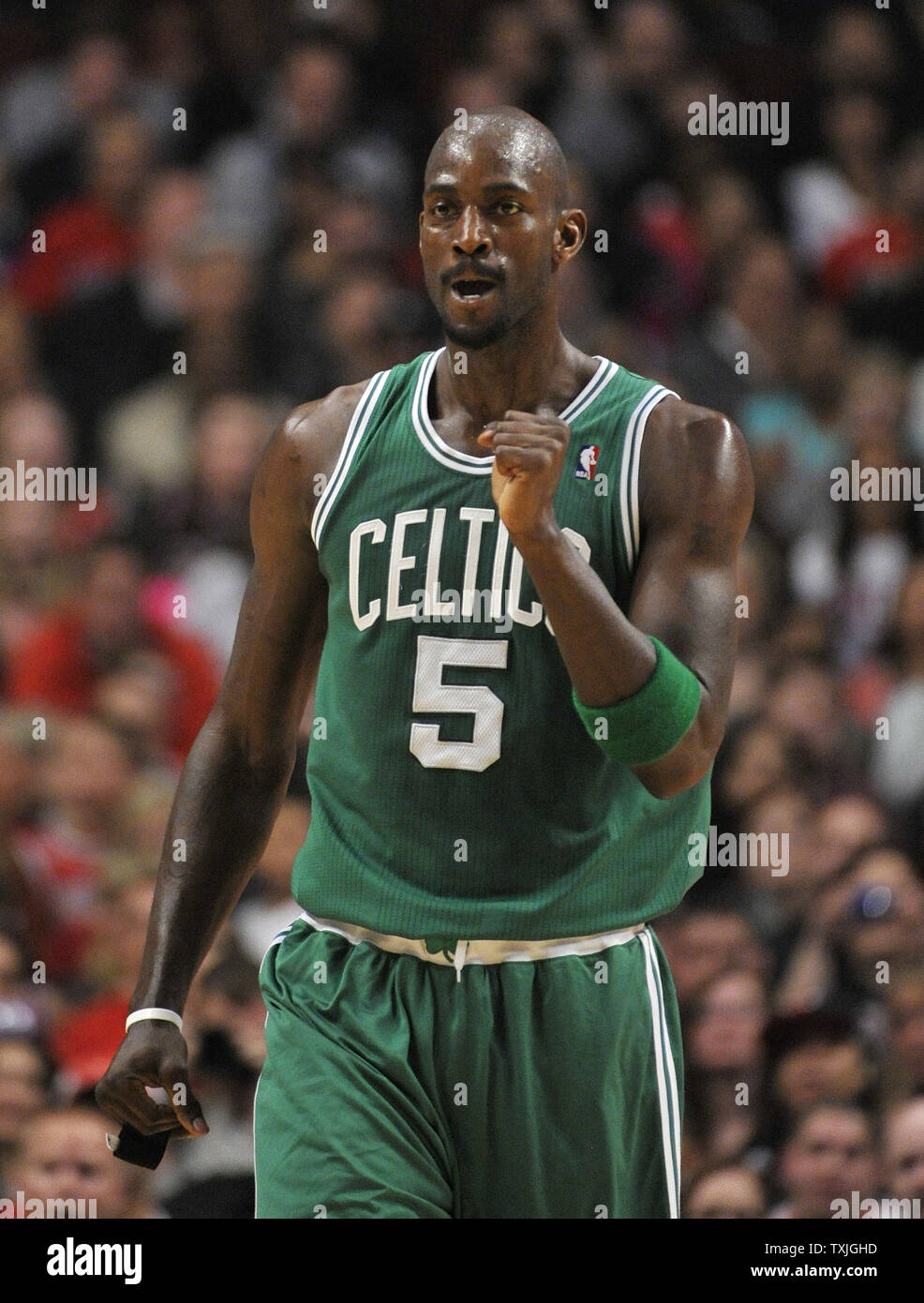 Boston Celtics forward Kevin Garnett pumps his fist after he was fouled during the first quarter against the Chicago Bulls at the United Center in Chicago on April 7, 2011.     UPI/Brian Kersey Stock Photo