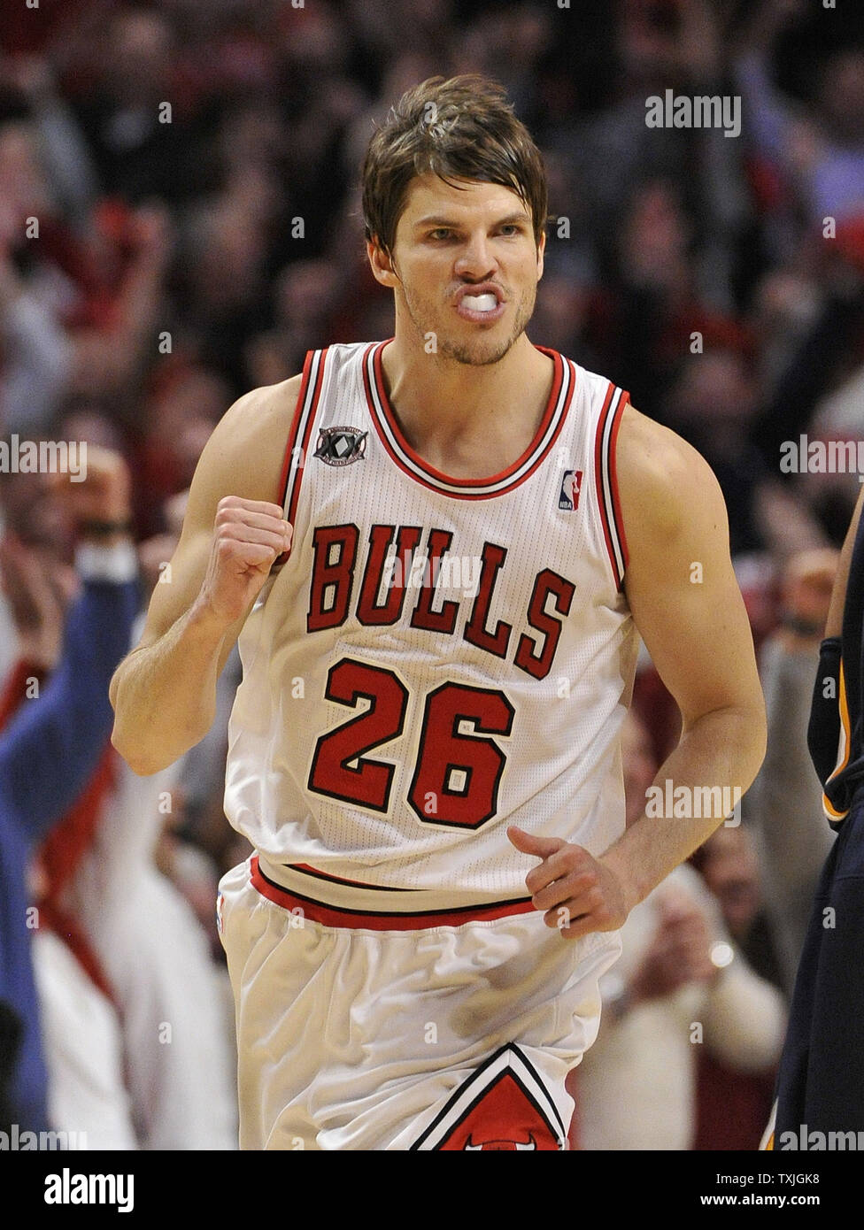 Chicago Bulls forward Kyle Korver pumps his fist after hitting a  three-point shot that gave the Bulls the lead late in the fourth quarter of  game 1 of the Eastern Conference Quarterfinals