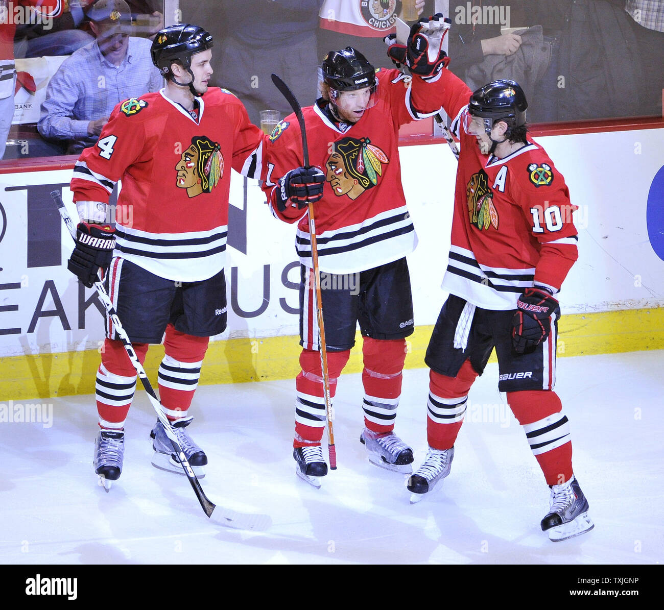 Chicago Blackhawks Niklas Hjalmarsson L R Of Sweden Brian Campbell And Patrick Sharp Celebrate Campbell S Goal During The Second Period Of Game 4 Of The Nhl Western Conference Quarterfinals Against The Vancouver Canucks