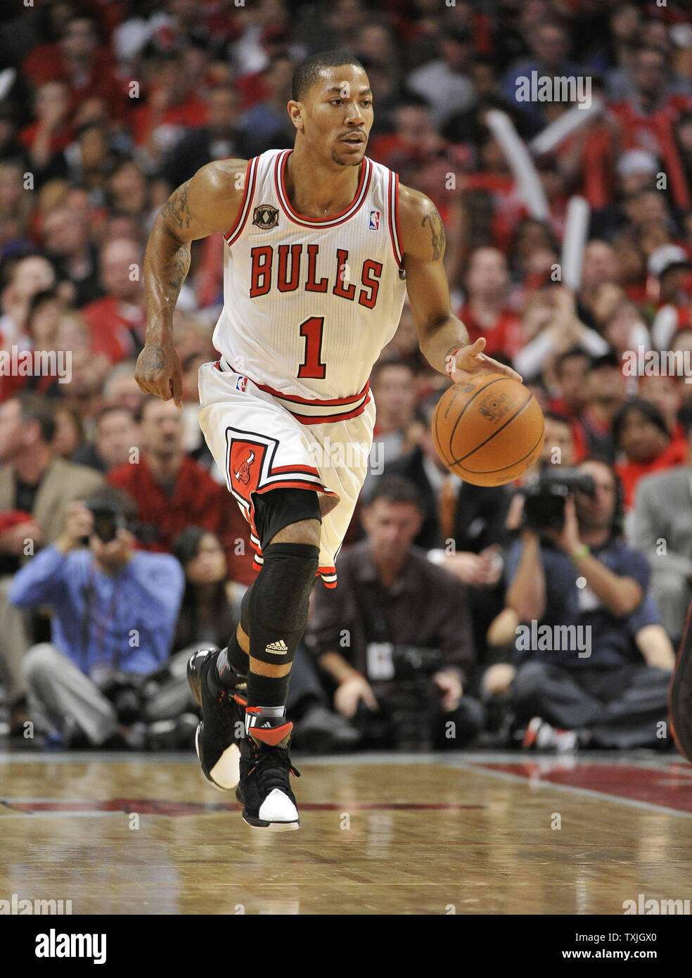 Chicago Bulls guard Derrick Rose brings the ball up the floor during the  fourth quarter of game 1 of the NBA Eastern Conference Semifinals at the  United Center in Chicago on May