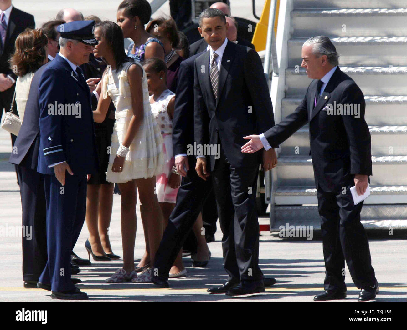 U.S. President Barack Obama is greeted by Chilean Foreign Minister Alfredo Moreno as he and his family arrive in Santiago, Chile on March 21, 2011. Obama traveled to Santiago, Chile, for the second stop of his Latin America visit.  UPI/Sebastian Padilla Rodriguez Stock Photo