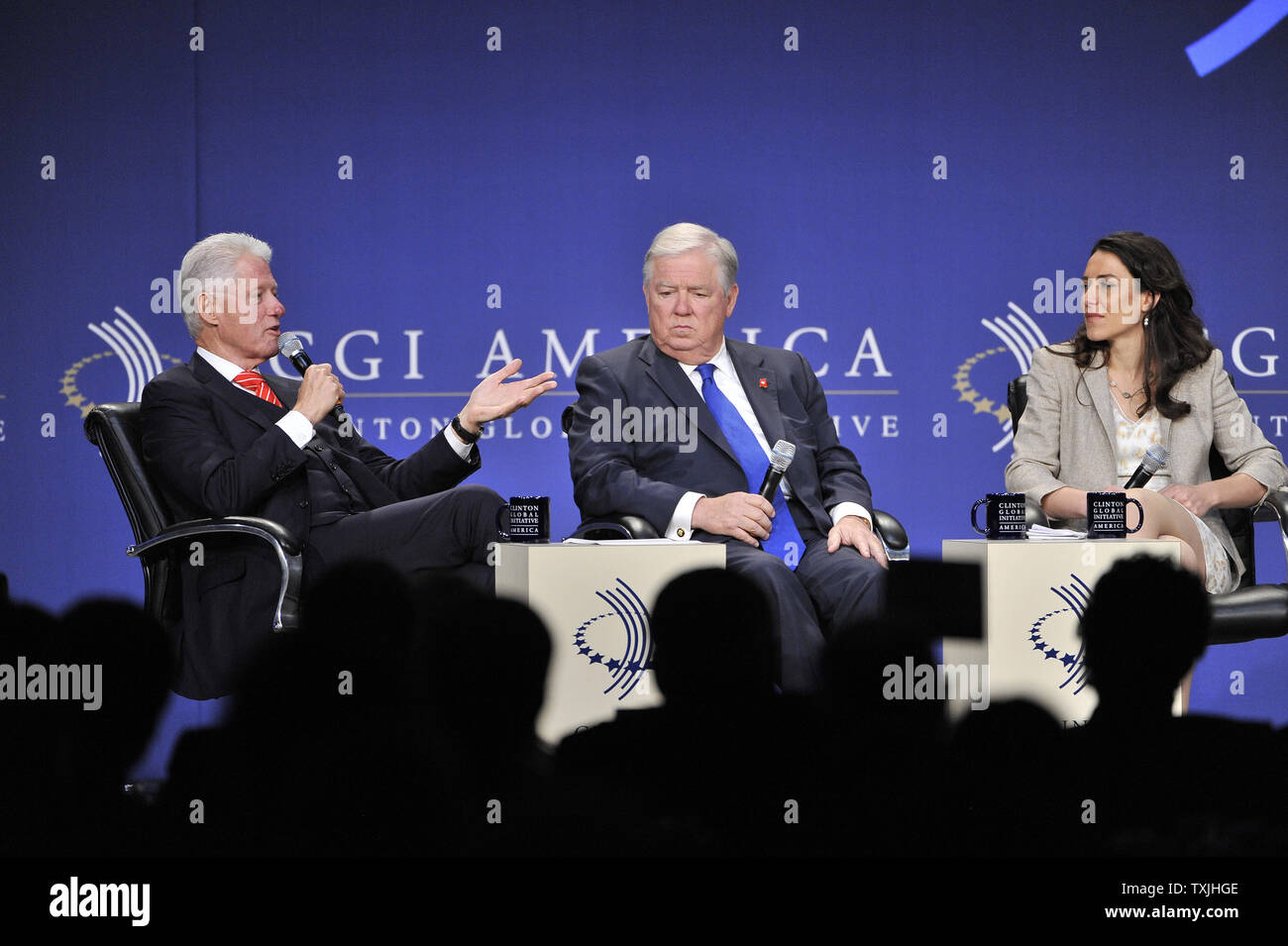 Former U.S. President Bill Clinton (L-R), Mississippi Gov. Haley Barbour and Bay Area Medical founder and CEO Simonida Cvejic, participate in a panel Discussion on jobs during the CGI America meeting on June 29, 2011 in Chicago. More than 700 business, government and non-profit leaders are participating in the two-day meeting, which is the first Clinton Global Initiative event to focus exclusively on driving job creation and economic growth in the United States.     UPI/Brian Kersey Stock Photo