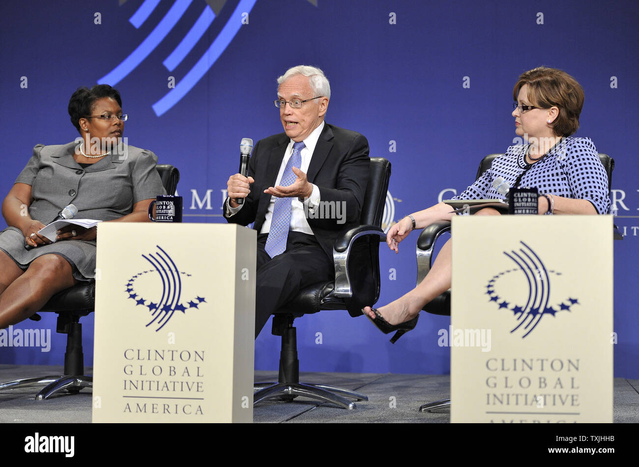 Nobel prize-winning, University of Chicago Economics professor James Heckman (C) speaks as D.C. Public Schools Chancellor Kaya Henderson (L) and Dow Corning Corporation Chairman Stephanie Burns listens during a panel discussion on education in America at the CGI America meeting on June 29, 2011 in Chicago. More than 700 business, government and non-profit leaders are participating in the two-day meeting, which is the first Clinton Global Initiative event to focus exclusively on driving job creation and economic growth in the United States.     UPI/Brian Kersey Stock Photo