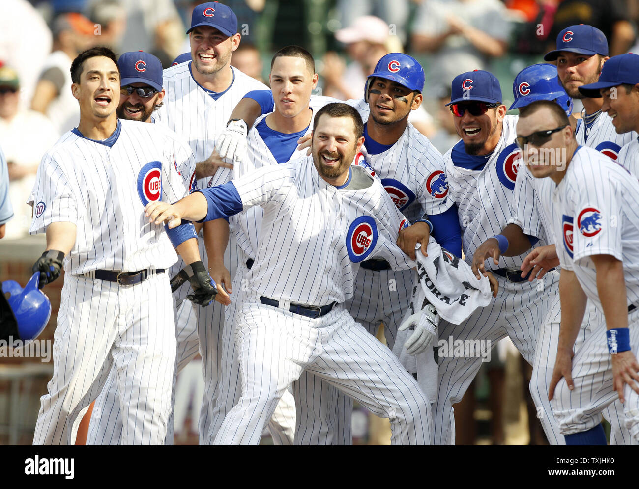 .The Chicago Cubs gather at home plate after pinch hitter Geovany Soto's three run home run to beat the San Francisco Giants during the thirteenth inning at Wrigley Field in Chicago on June 30, 2011. The Cubs defeated the Giants 5-2 in 13 innings. UPI /Mark Cowan Stock Photo