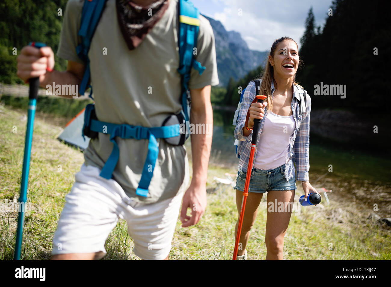 Woman with friends hiking in country side stock photo (154688