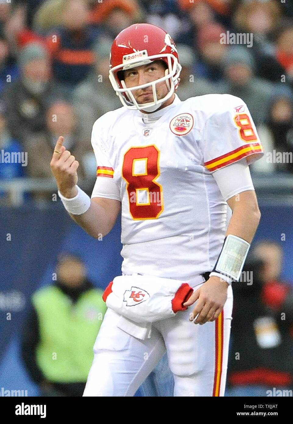 Kansas City Chiefs quarterback Kyle Orton (8) holds up his injured finger  during the second quarter against the Chicago Bears at Soldier Field on  December 4, 2011 in Chicago. Orton only played